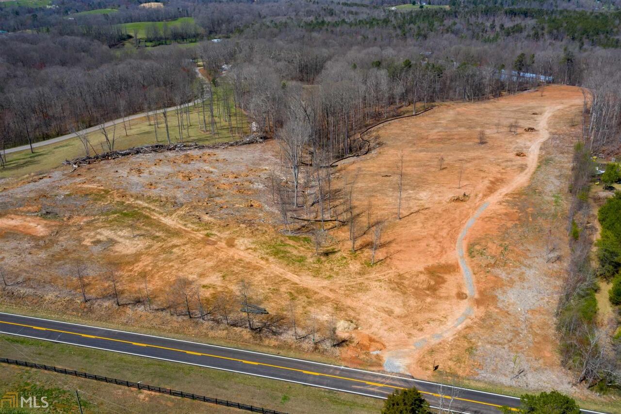 6463 Kenimer Road Clermont, GA 30527 - Photo 1 of 1 a view of a yard with wooden fence