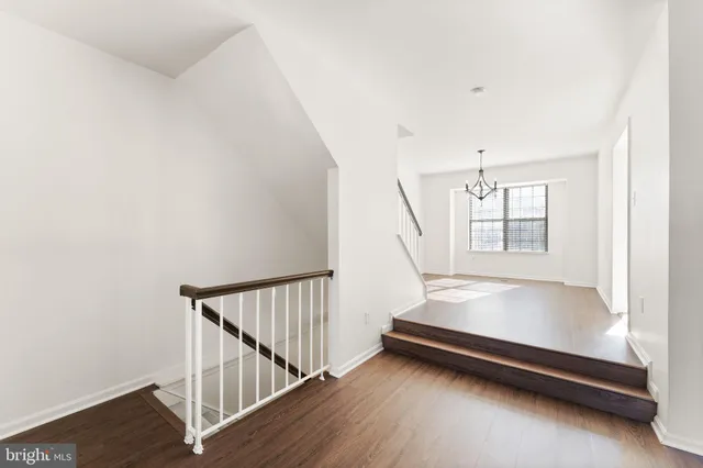 a view of entryway with wooden floor