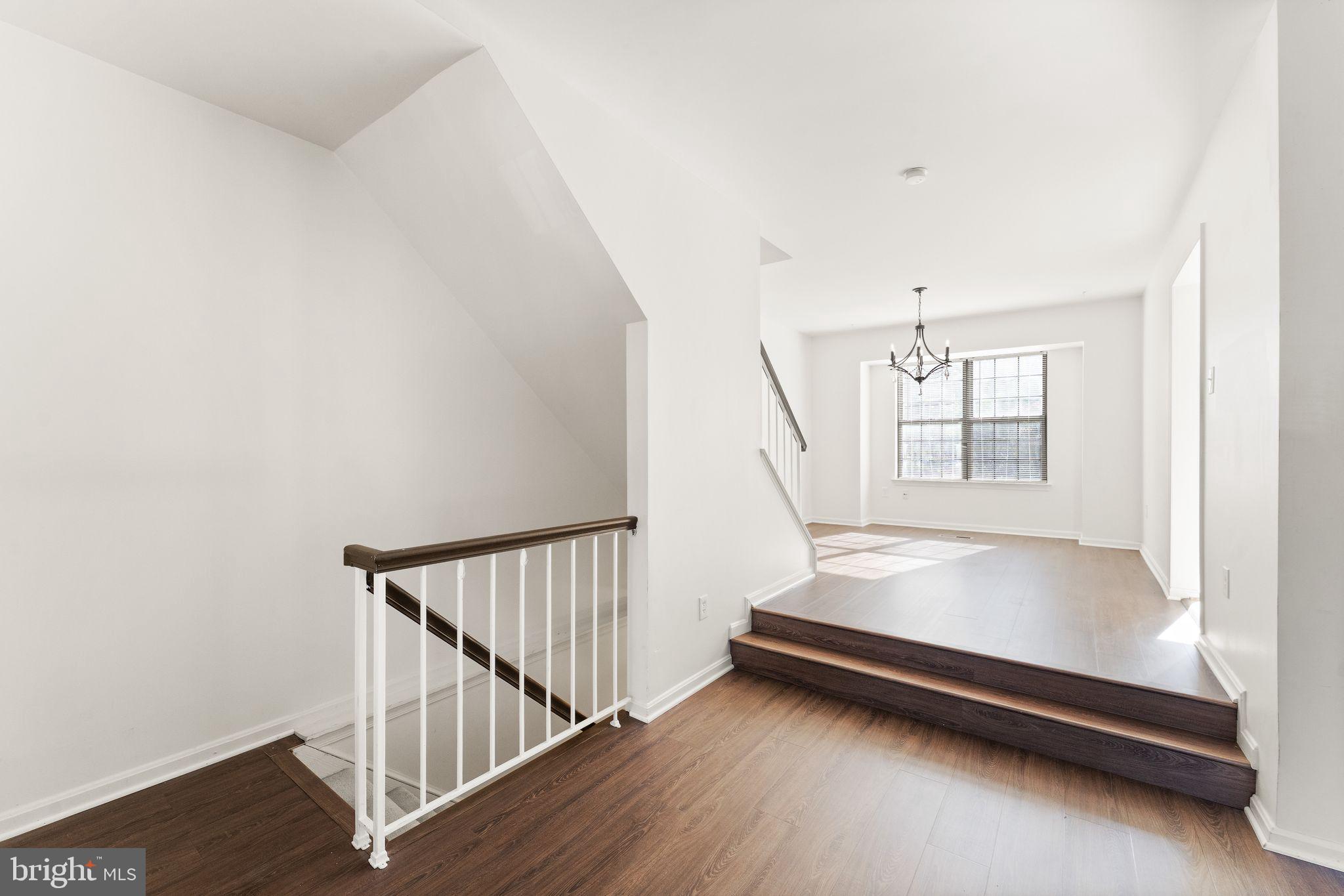 6001 Little Brook Court Clifton, VA 20124 - Photo 12 of 46 a view of entryway with wooden floor