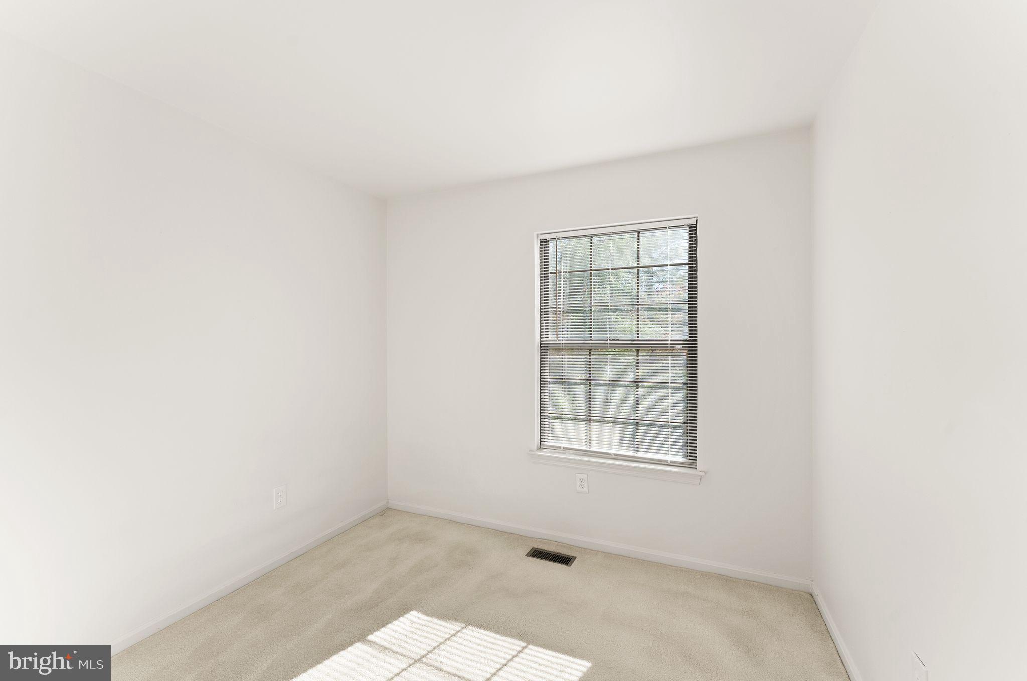 6001 Little Brook Court Clifton, VA 20124 - Photo 21 of 46 an empty room with windows
