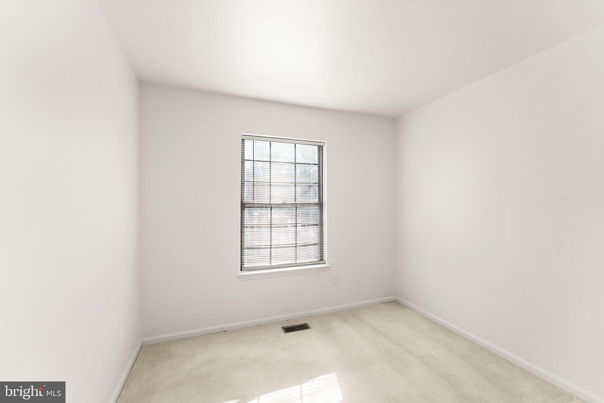 6001 Little Brook Court Clifton, VA 20124 - Photo 24 of 46 an empty room with windows