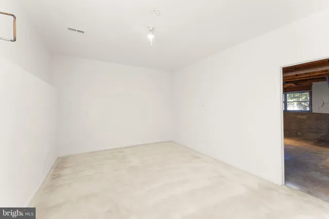 a view of a room with windows