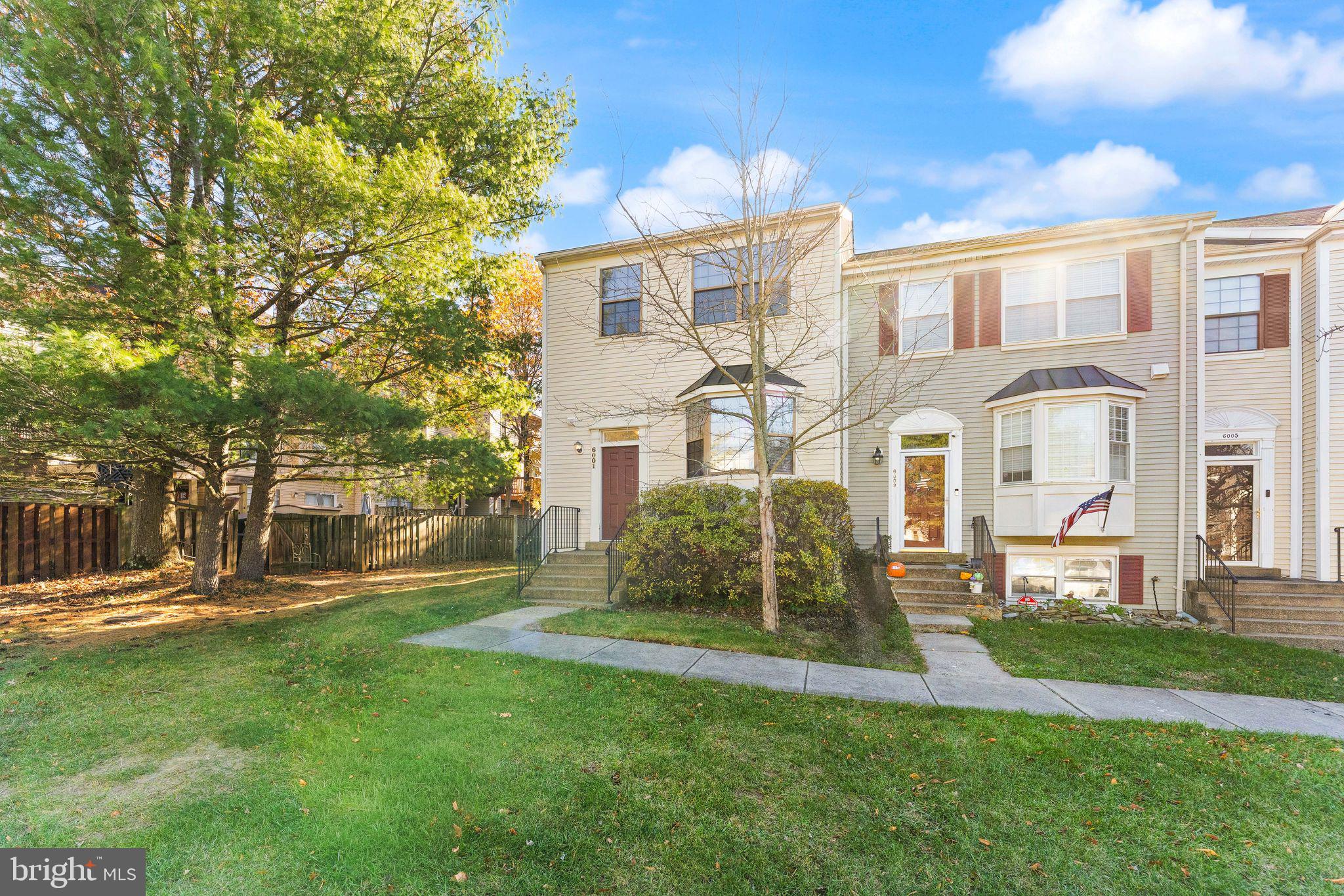 6001 Little Brook Court Clifton, VA 20124 - Photo 42 of 46 a front view of a house with a garden