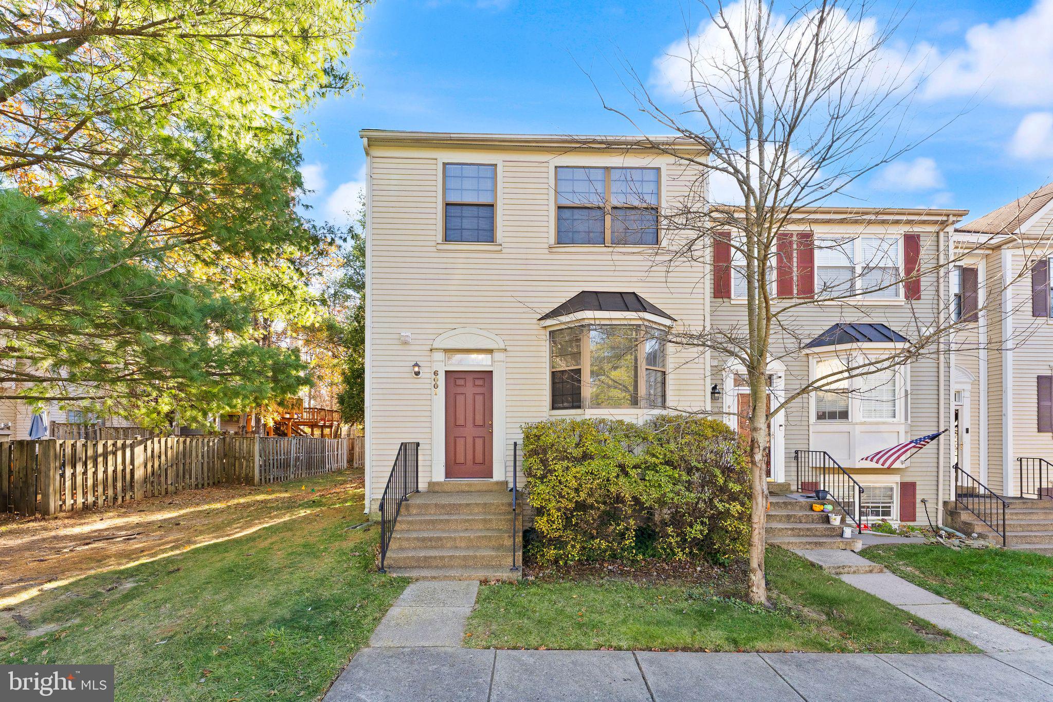 6001 Little Brook Court Clifton, VA 20124 - Photo 43 of 46 a front view of a house with a yard