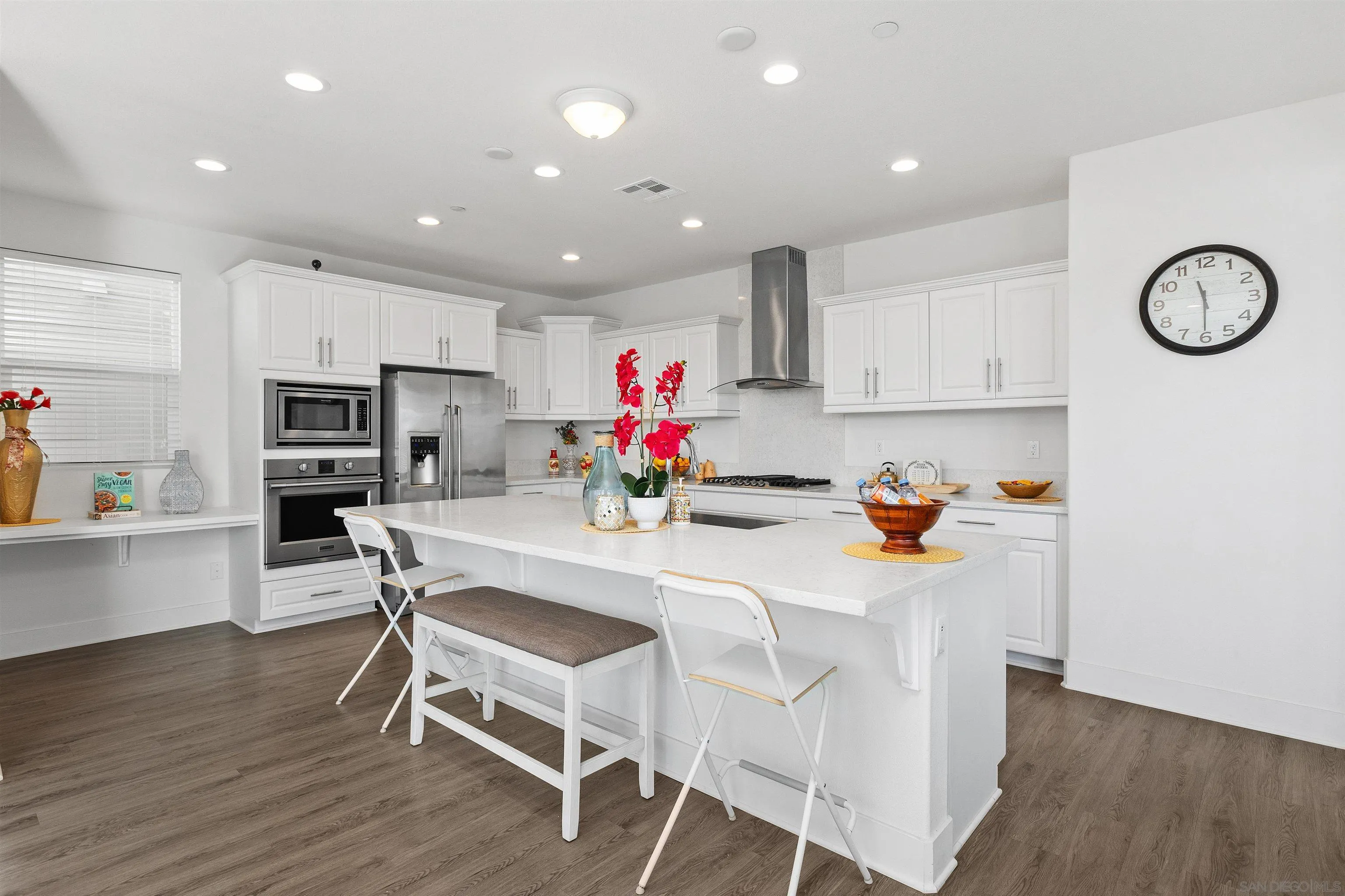 35732 Garrano Lane Fallbrook, CA 92028 - Photo 14 of 44 a view of kitchen with cabinets and wooden floor