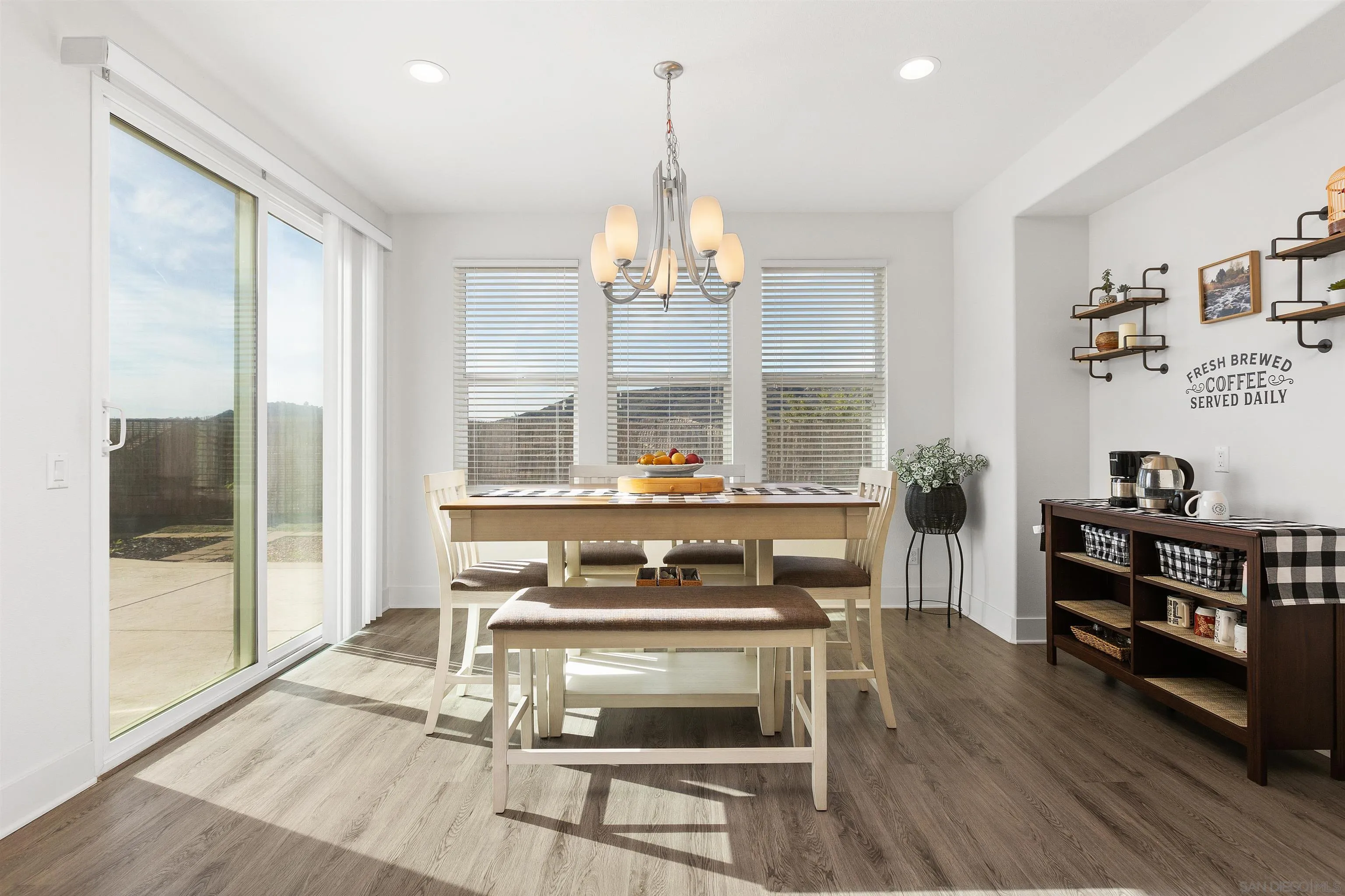 35732 Garrano Lane Fallbrook, CA 92028 - Photo 18 of 44 a living room with stainless steel appliances kitchen island granite countertop furniture and a chandelier