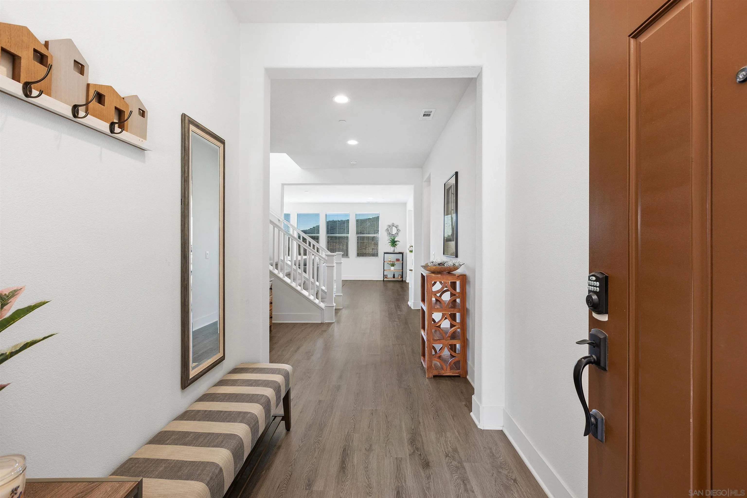 35732 Garrano Lane Fallbrook, CA 92028 - Photo 3 of 44 a view of entryway and hall with wooden floor
