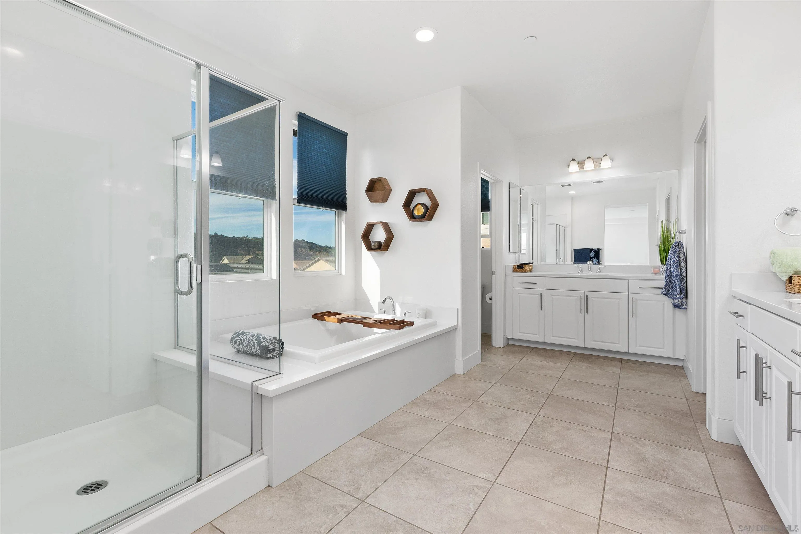 35732 Garrano Lane Fallbrook, CA 92028 - Photo 32 of 44 a large white kitchen with a sink and cabinets