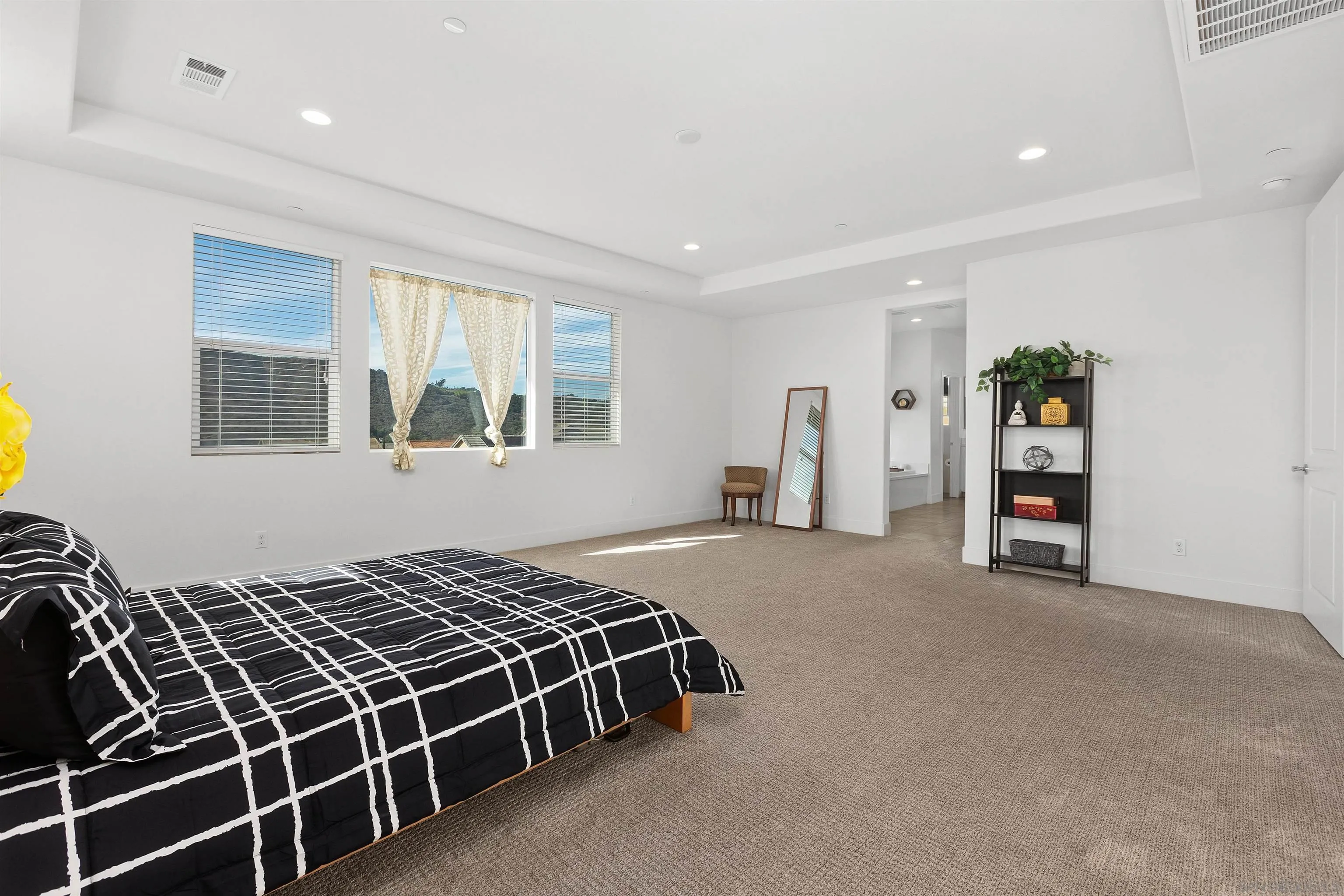 35732 Garrano Lane Fallbrook, CA 92028 - Photo 34 of 44 a bedroom with a bed and a window