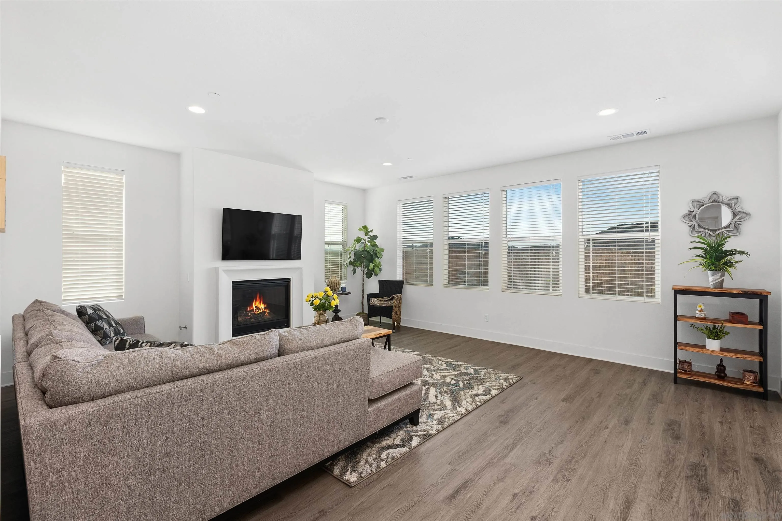 35732 Garrano Lane Fallbrook, CA 92028 - Photo 6 of 44 a living room with furniture and a flat screen tv