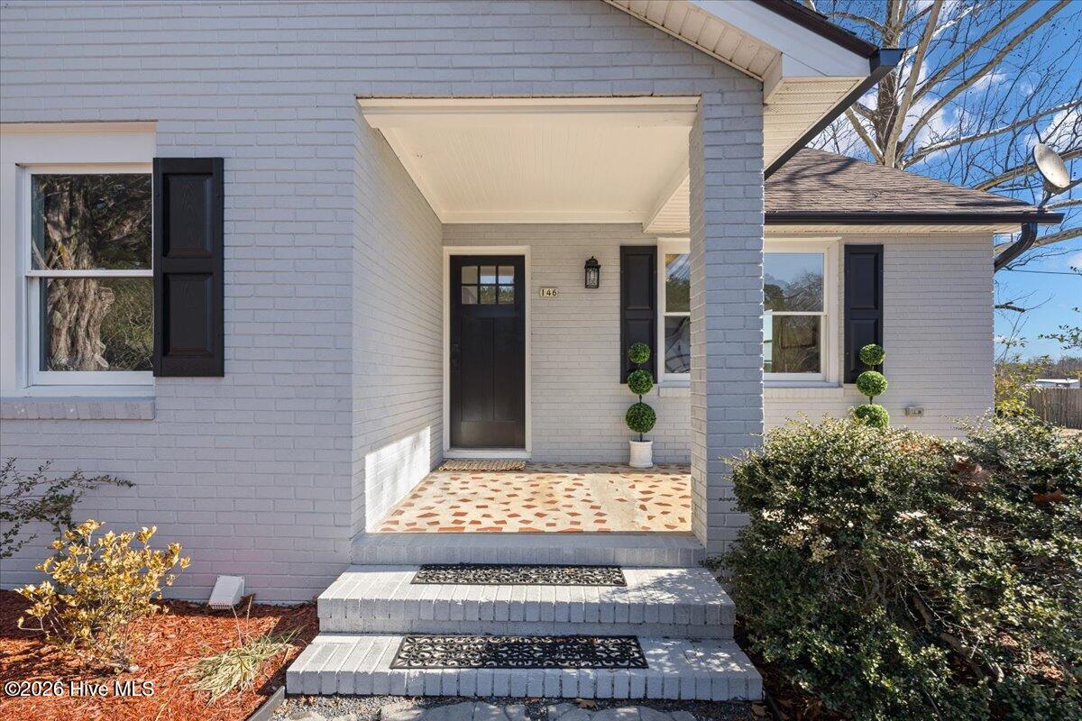 146 Union Church Road Carthage, NC 28327 - Photo 2 of 22 The covered porch features an inlet laid concrete design. Must see in person!