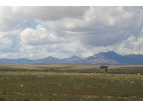 7707 East Irwin Ranch Road Prescott Valley, AZ 86315 - Photo 12 of 12 a view of an ocean and mountain