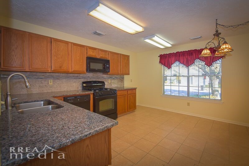19723 Glenfinch Lane Spring, TX 77379 - Photo 13 of 39 Kitchen has room for a table and chairs