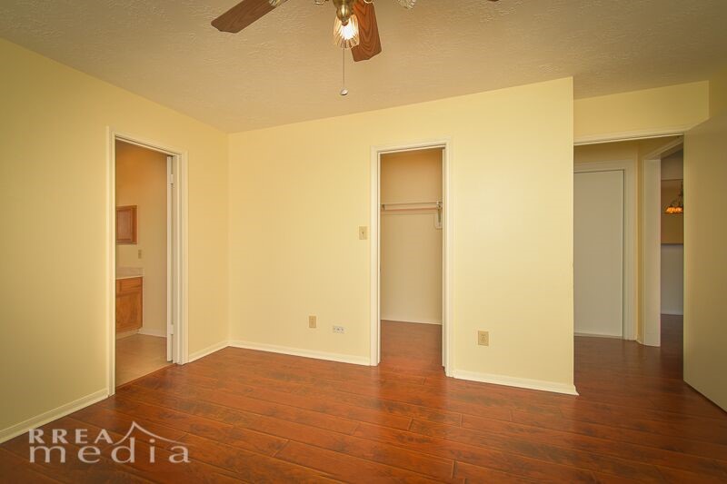 19723 Glenfinch Lane Spring, TX 77379 - Photo 14 of 39 Primary Bedroom has updated floors that are scraped, hardwood looking laminate flooring