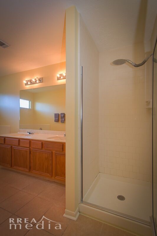 19723 Glenfinch Lane Spring, TX 77379 - Photo 17 of 39 Primary Bathroom has double vanity sinks