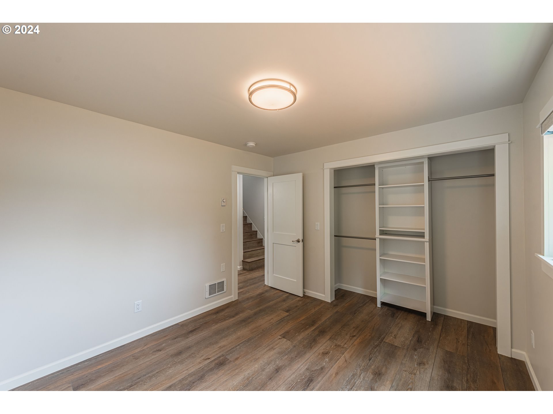 66013 North Bay Road North Bend, OR 97459 - Photo 23 of 48 a view of an empty room with a window