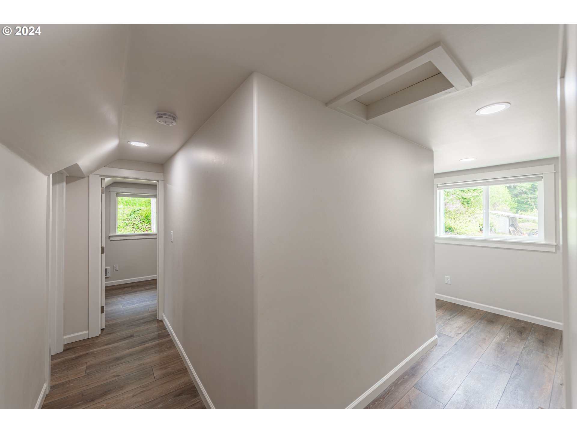 66013 North Bay Road North Bend, OR 97459 - Photo 25 of 48 a view interior of a house and an entryway with wooden floor