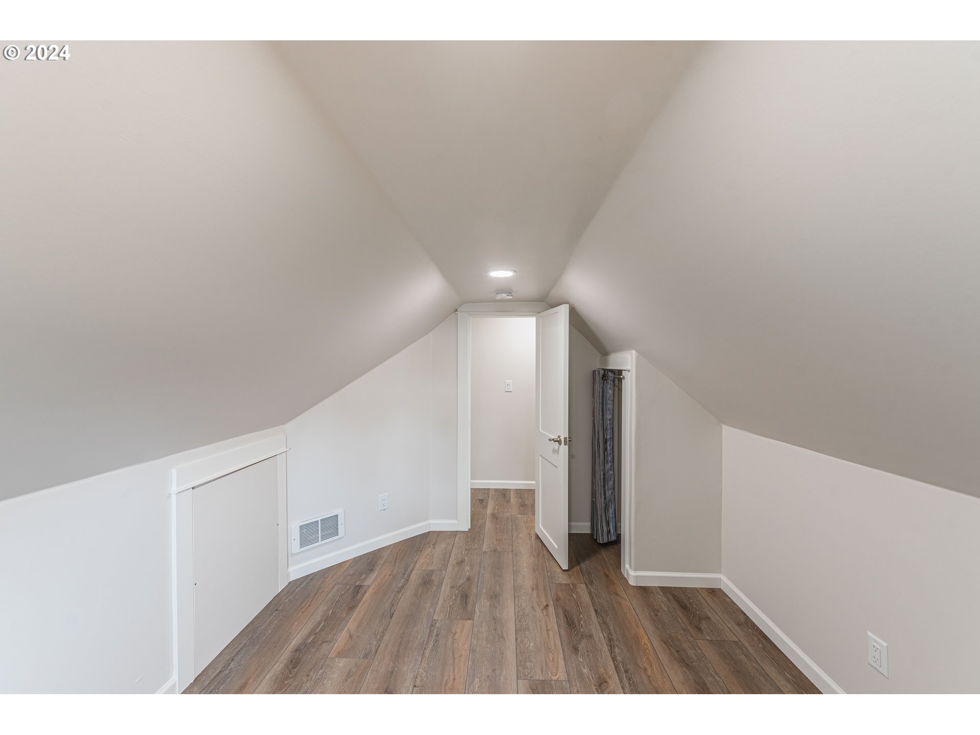 66013 North Bay Road North Bend, OR 97459 - Photo 32 of 48 a view of an empty room and wooden floor
