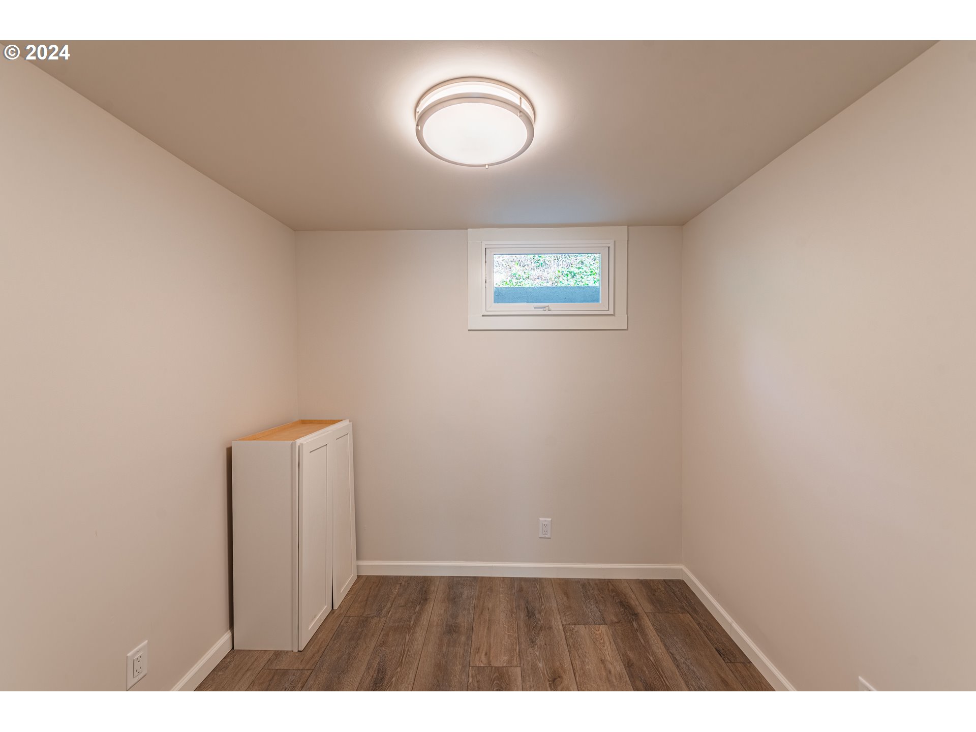 66013 North Bay Road North Bend, OR 97459 - Photo 40 of 48 a view of an empty room with a window