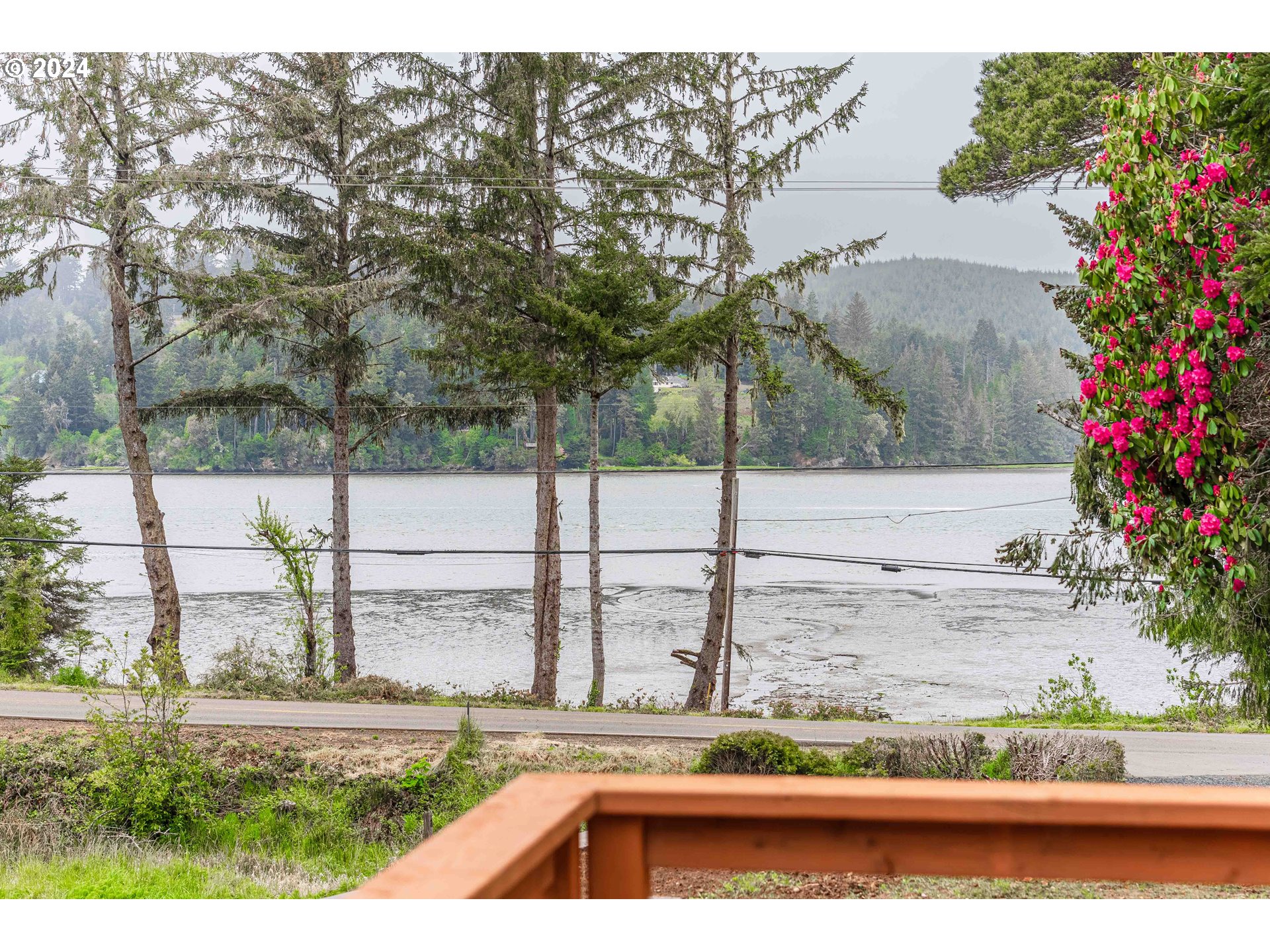 66013 North Bay Road North Bend, OR 97459 - Photo 43 of 48 a view of a backyard of the house