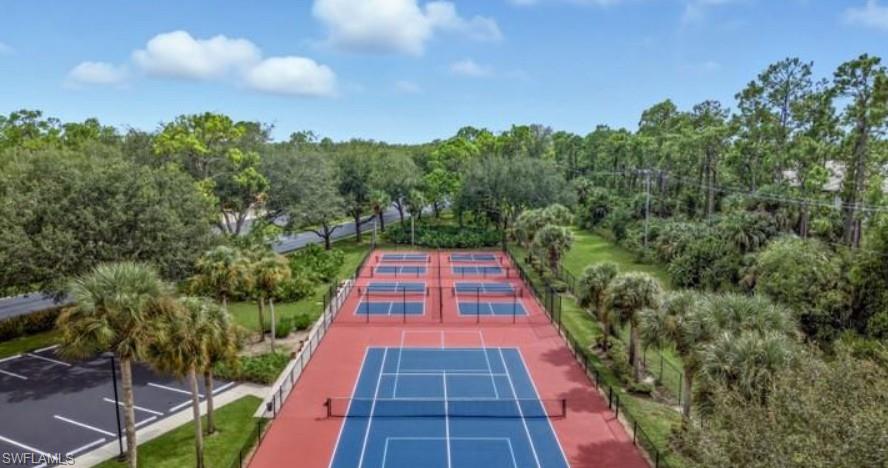 280 Robin Hood Circle, Unit 102 Naples, FL 34104 - Photo 16 of 24 a view of balcony with yard