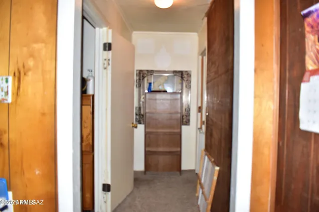 a white refrigerator freezer sitting inside of a kitchen