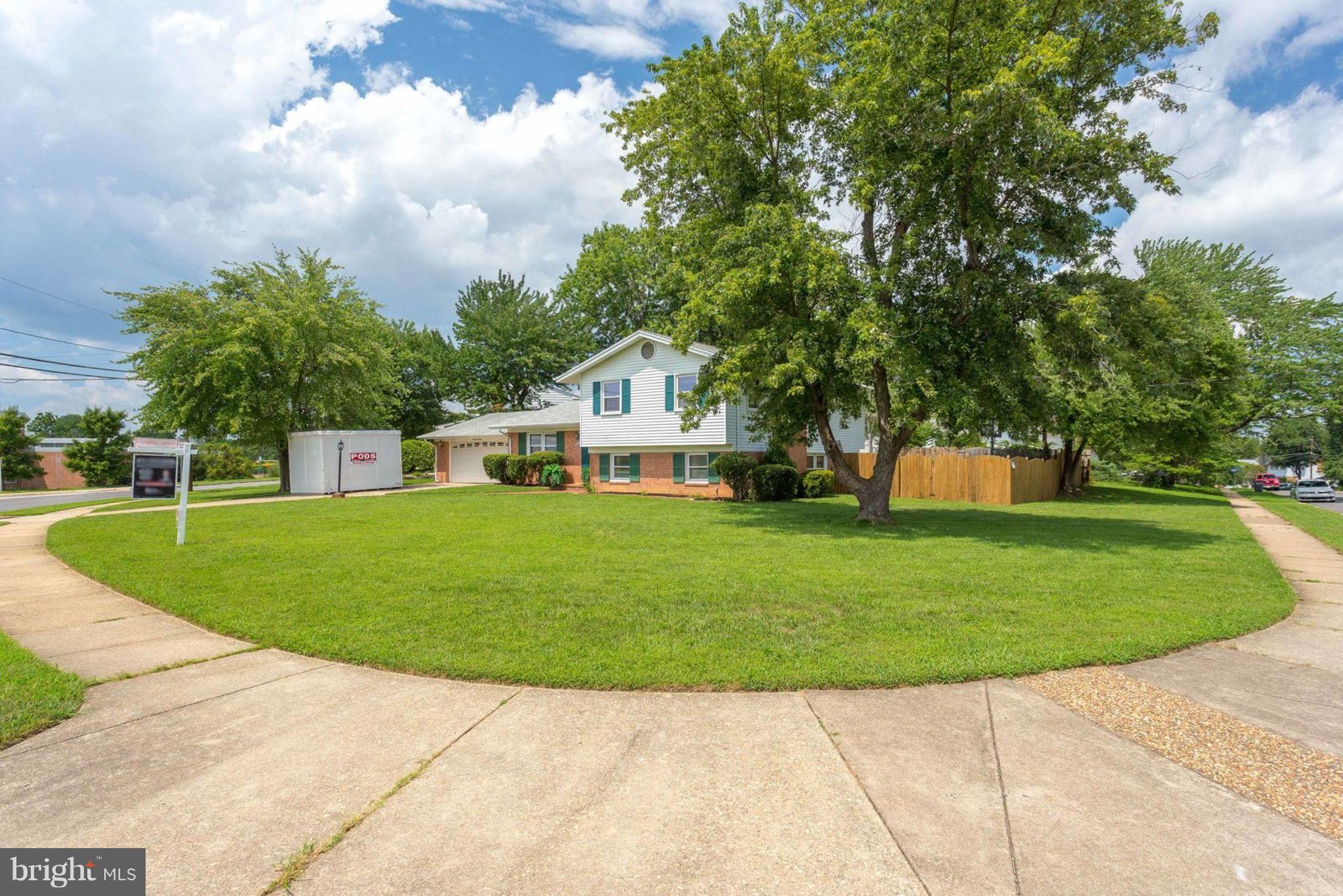 6420 Meriwether Lane Springfield, VA 22150 - Photo 2 of 27 Attractive rounded front lawn