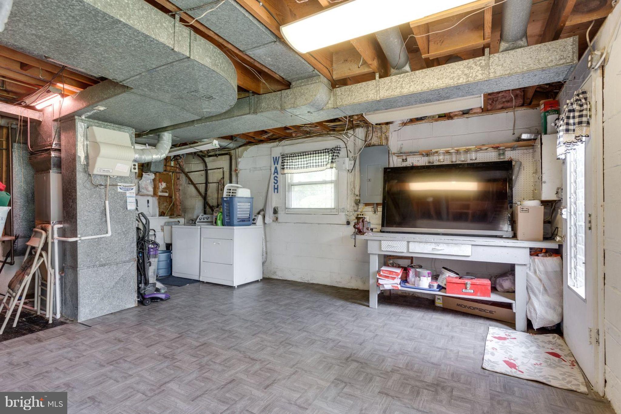 6420 Meriwether Lane Springfield, VA 22150 - Photo 21 of 27 Large garage with ample storage space