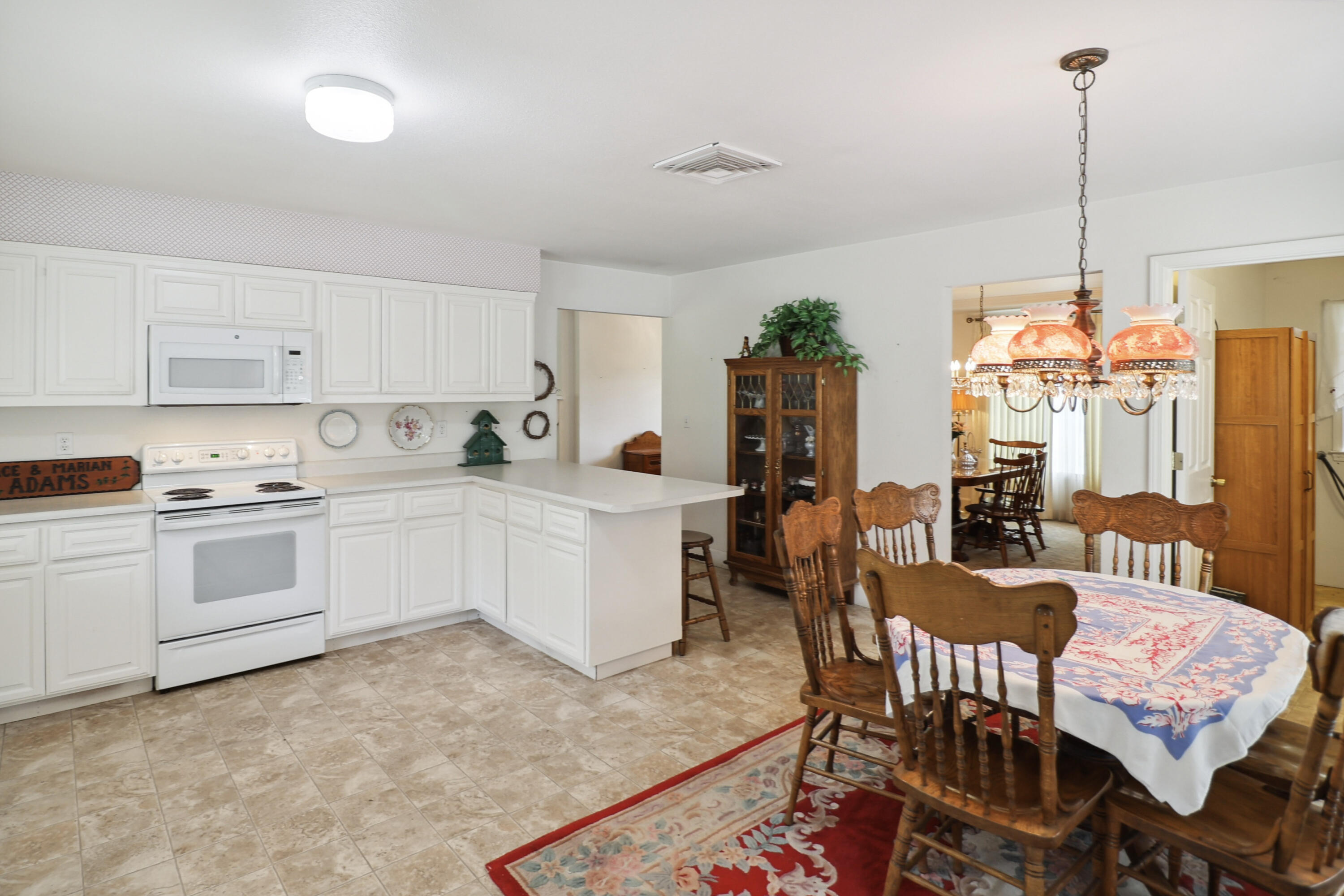 9400 Placer Road Redding, CA 96001 - Photo 11 of 52 a kitchen that has a cabinets counter space and appliances