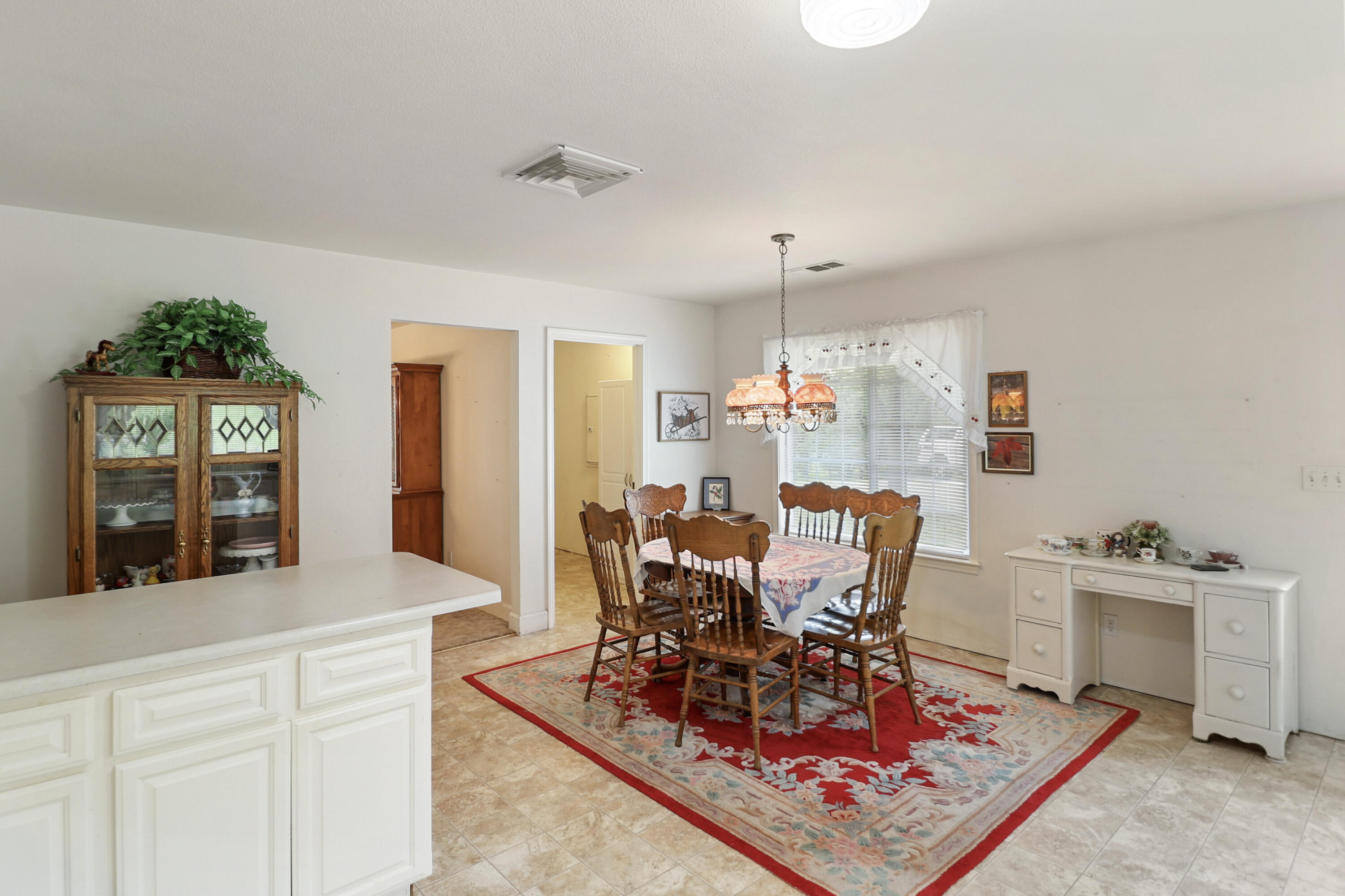 9400 Placer Road Redding, CA 96001 - Photo 13 of 52 a living room with furniture and a dining table