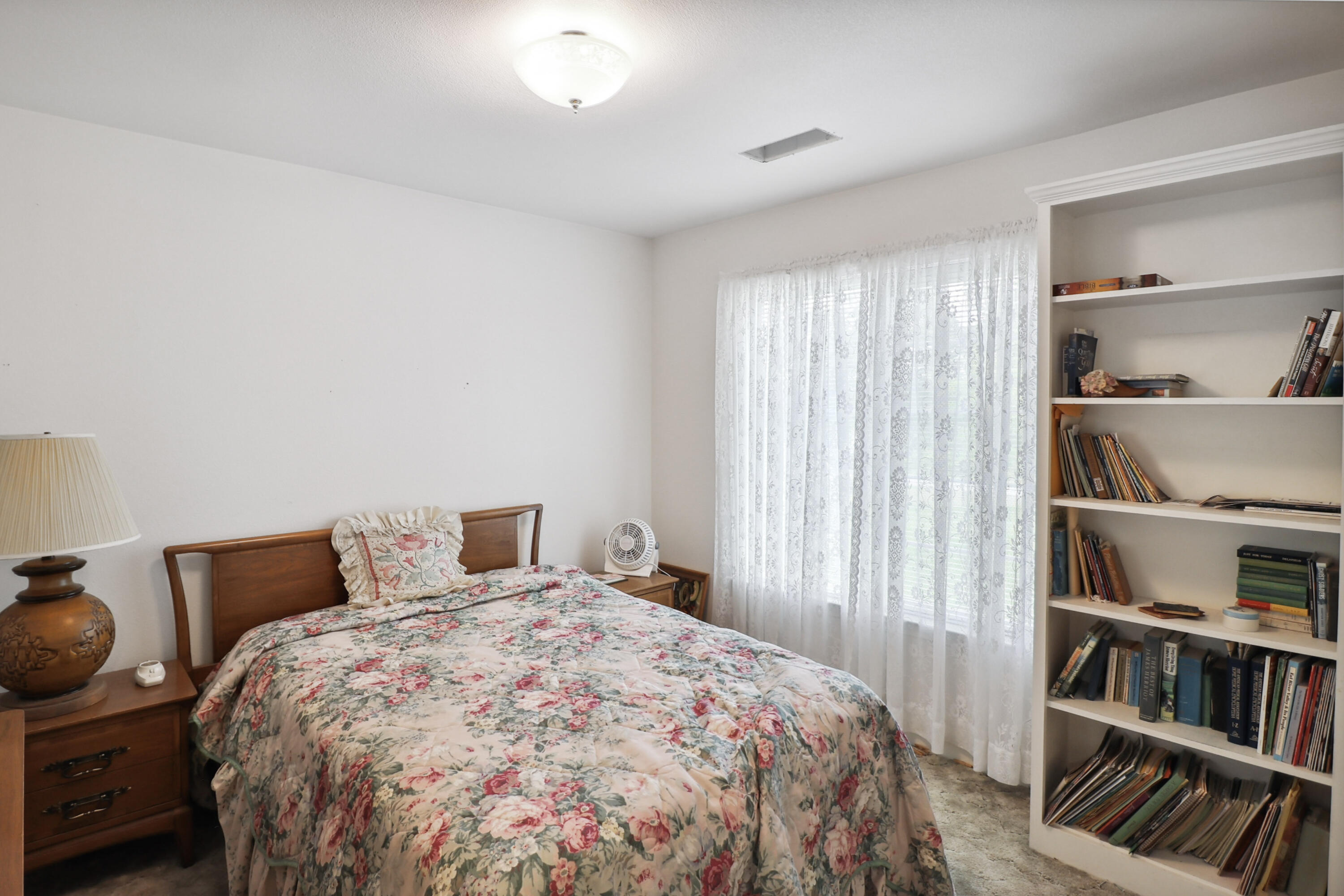 9400 Placer Road Redding, CA 96001 - Photo 18 of 52 a bedroom with a bed and closet