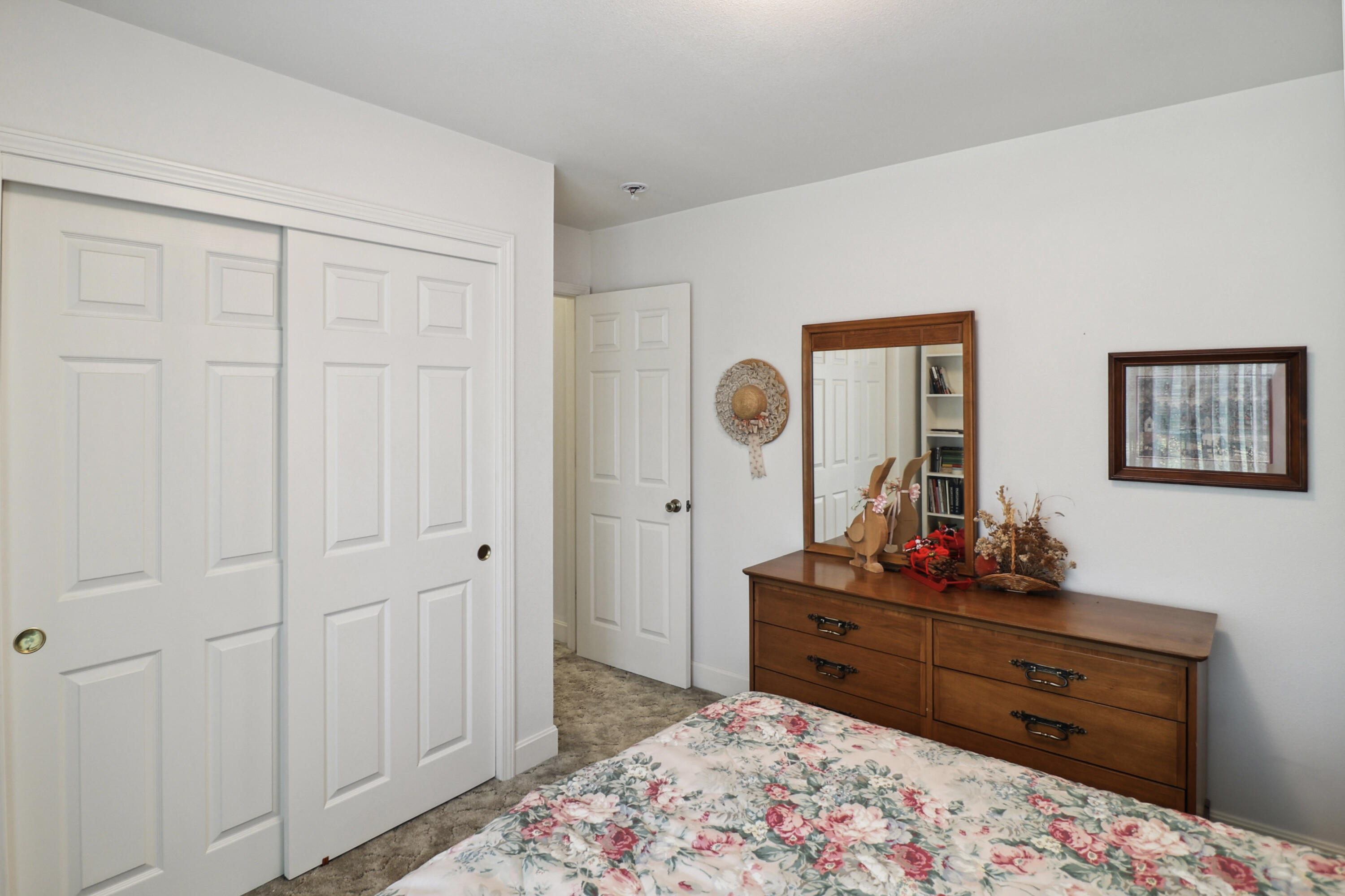 9400 Placer Road Redding, CA 96001 - Photo 19 of 52 a bed room with a bed and a dresser
