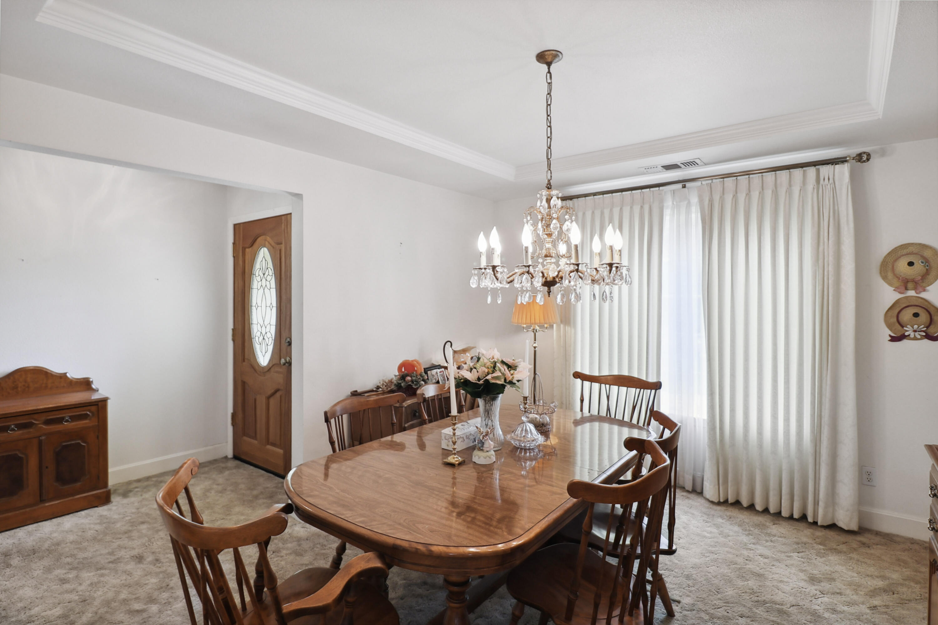 9400 Placer Road Redding, CA 96001 - Photo 4 of 52 a view of a dining room with furniture window and wooden floor