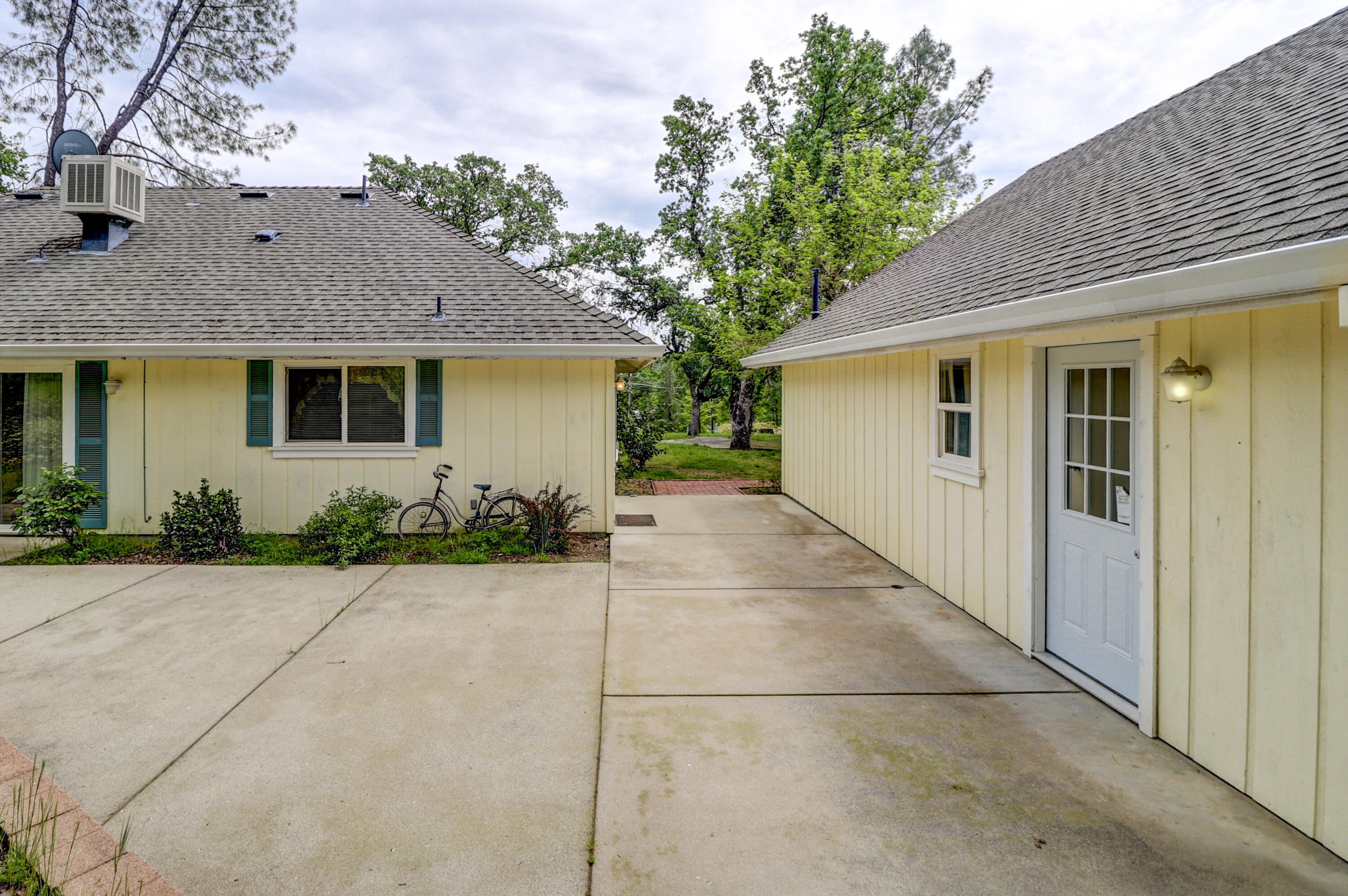 9400 Placer Road Redding, CA 96001 - Photo 46 of 52 a view of a house with a patio