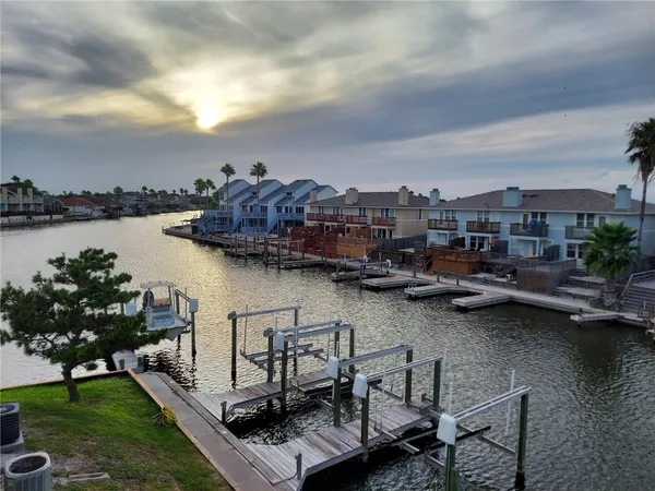 a view of a lake with multiple houses