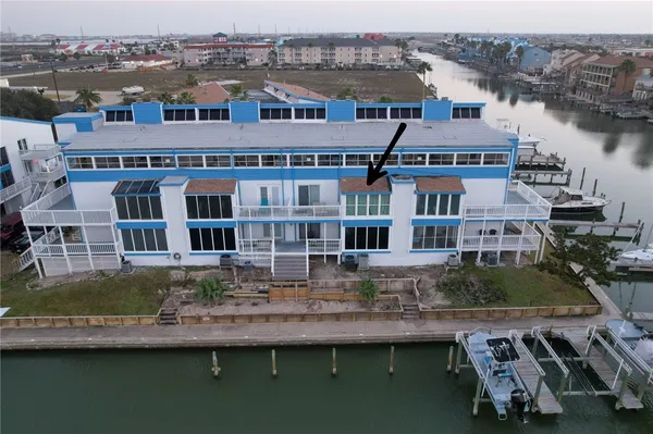 a aerial view of a building with lake view