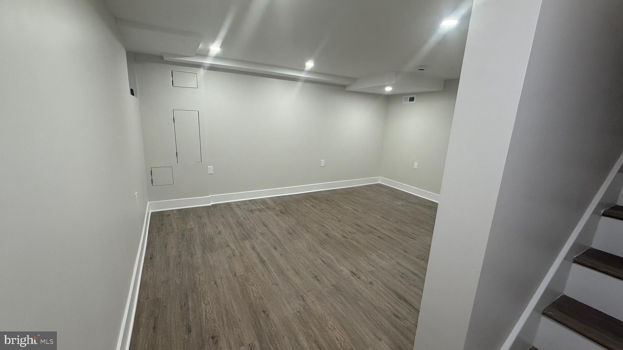 3802 Rokeby Road Baltimore, MD 21229 - Photo 15 of 16 wooden floor in an empty room