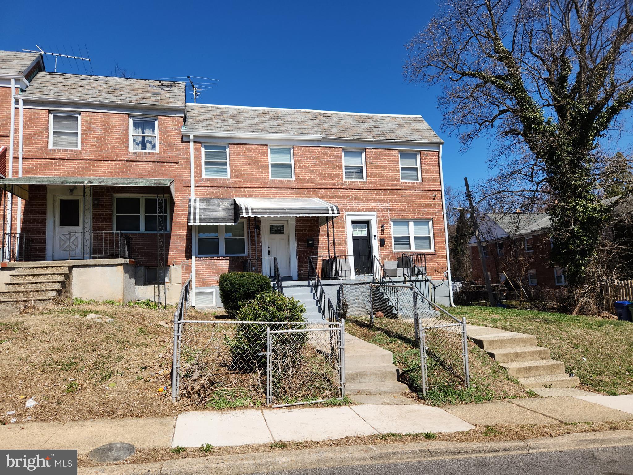 3802 Rokeby Road Baltimore, MD 21229 - Photo 3 of 16 front view of a house with a yard