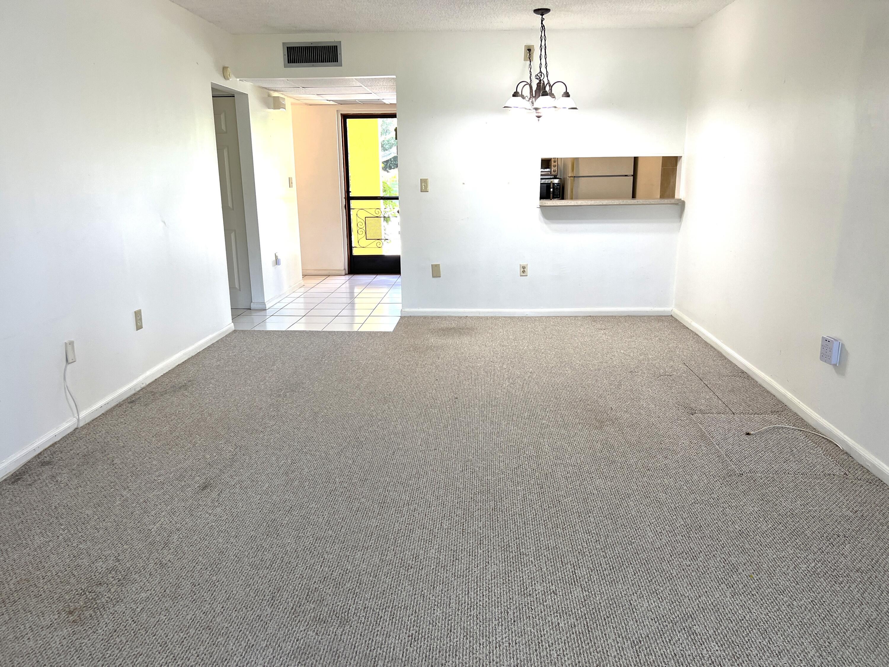 a view of a room with a sink and a window