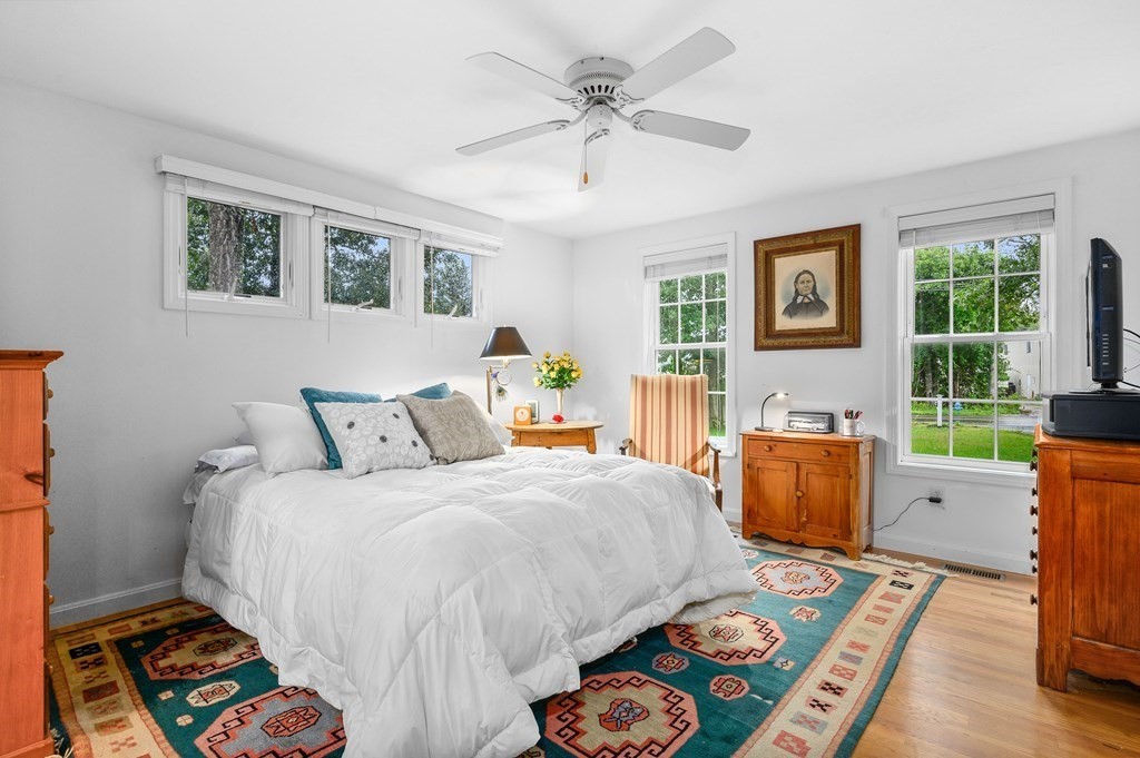 120 Queen Anne Road Harwich, MA 02645 - Photo 12 of 35 a bed room with a bed and a couch