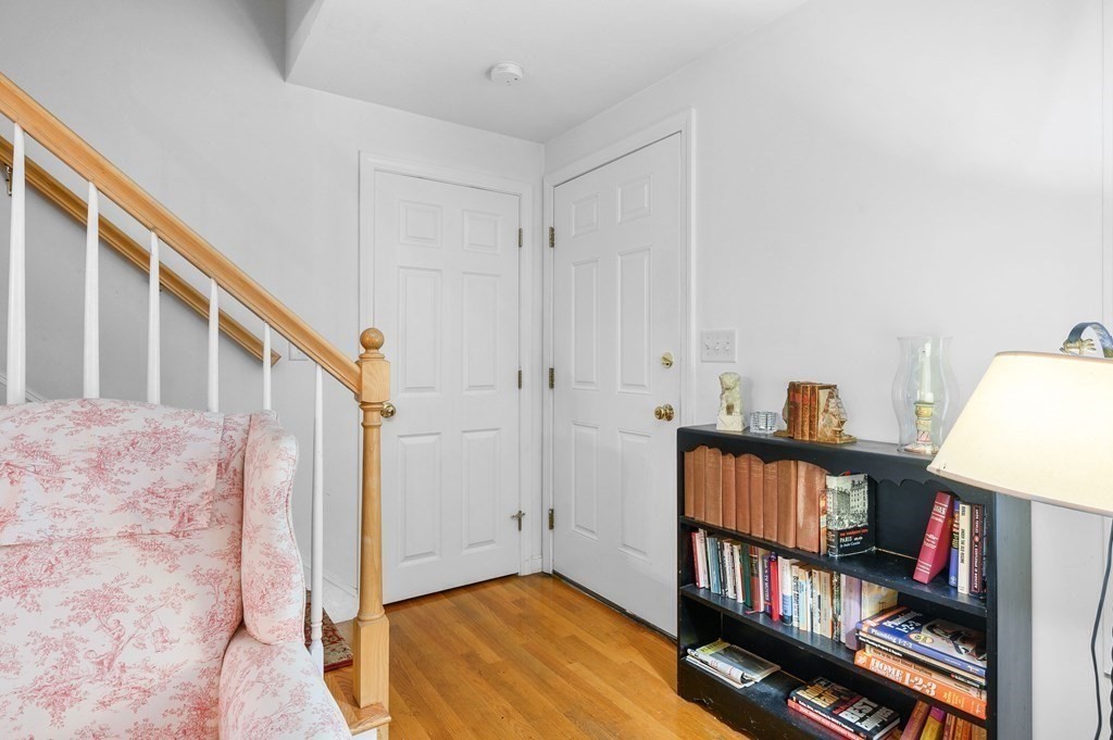 120 Queen Anne Road Harwich, MA 02645 - Photo 16 of 35 a view of a bedroom with workspace and book shelf