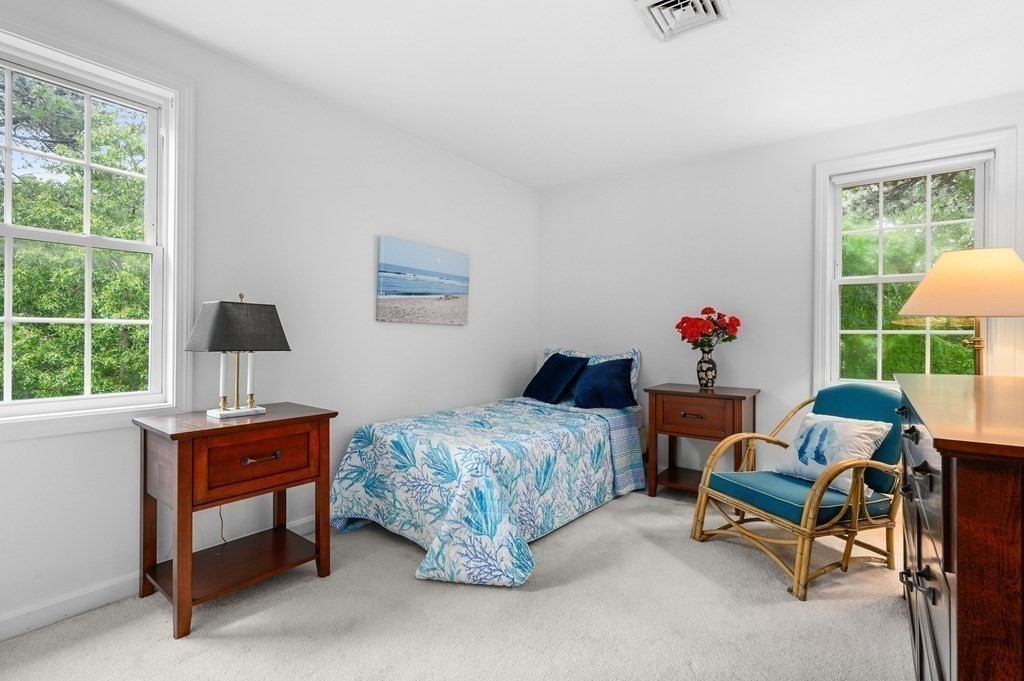 120 Queen Anne Road Harwich, MA 02645 - Photo 17 of 35 a bedroom with a bed and a window