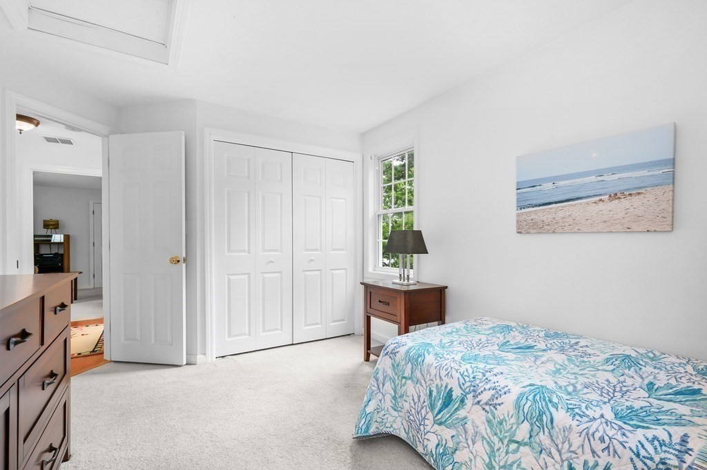 120 Queen Anne Road Harwich, MA 02645 - Photo 18 of 35 a bedroom with a bed and a window