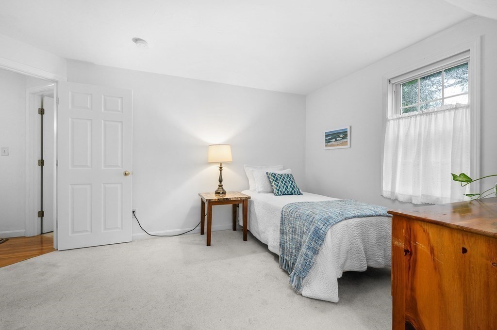 120 Queen Anne Road Harwich, MA 02645 - Photo 20 of 35 a bed room with a bed and a window
