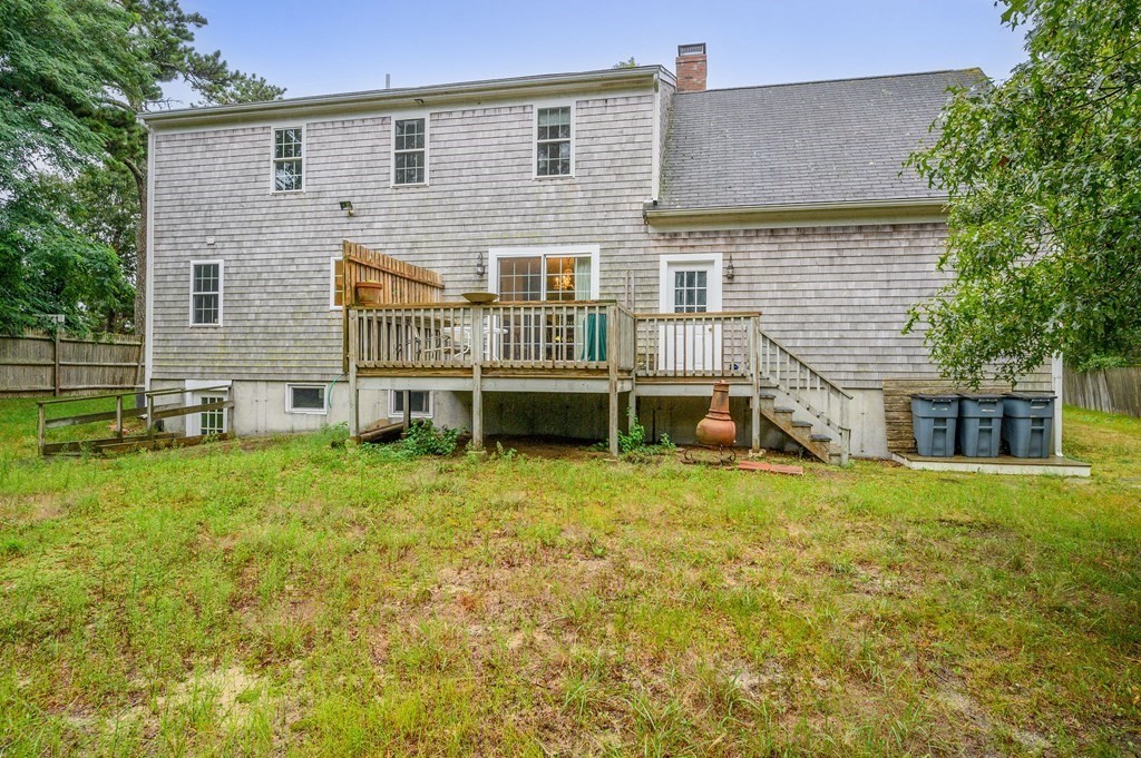 120 Queen Anne Road Harwich, MA 02645 - Photo 30 of 35 front view of a house with a yard