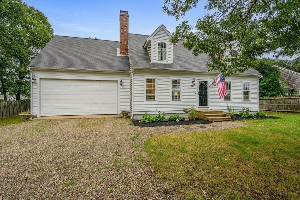 120 Queen Anne Road Harwich, MA 02645 - Photo 34 of 35 a front view of house with yard and trees