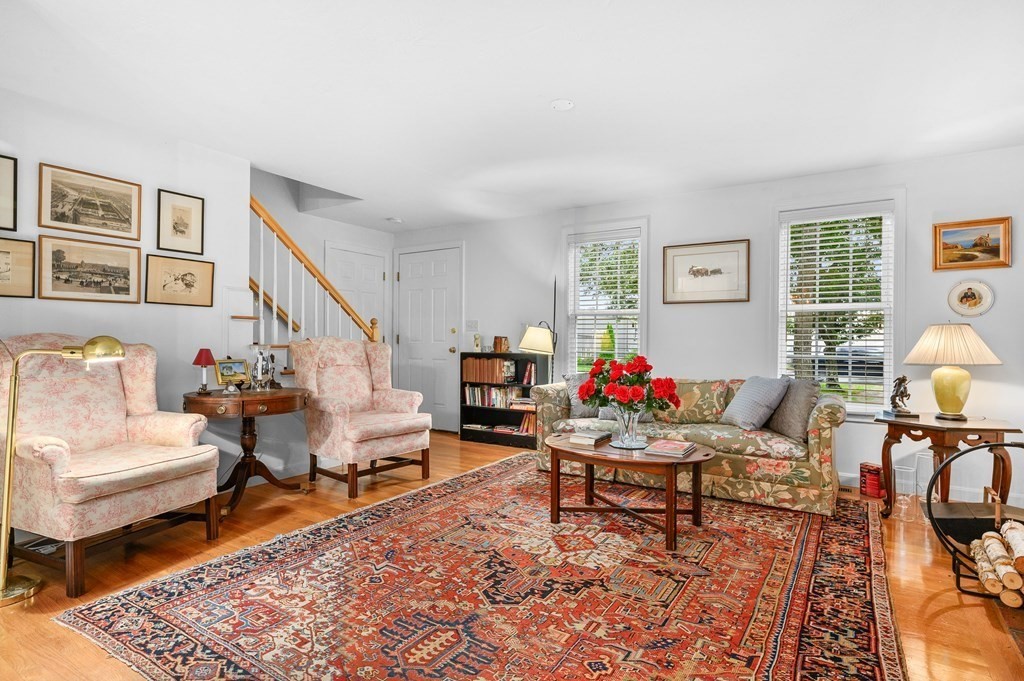 120 Queen Anne Road Harwich, MA 02645 - Photo 4 of 35 a living room with furniture and wooden floor
