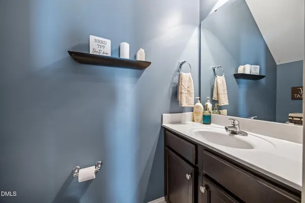 a kitchen with stainless steel appliances granite countertop a refrigerator stove and microwave