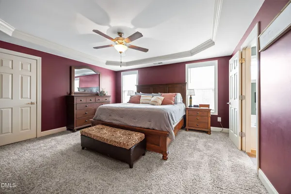 a bathroom with a sink vanity and a toilet
