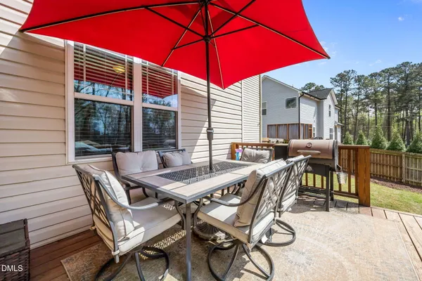 a view of wooden house with large windows